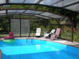 The swimming pool can be covered for those cool 'English summer' days or open to the 
  elements. A good size for swimmers or those who just want a cooling dip.